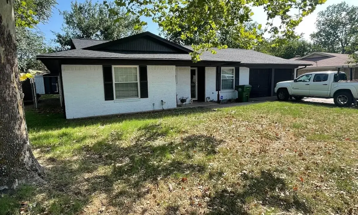 Professional roofing crew working on a residential roof in Lincolnton